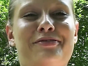 MILF shows off pussy in the park